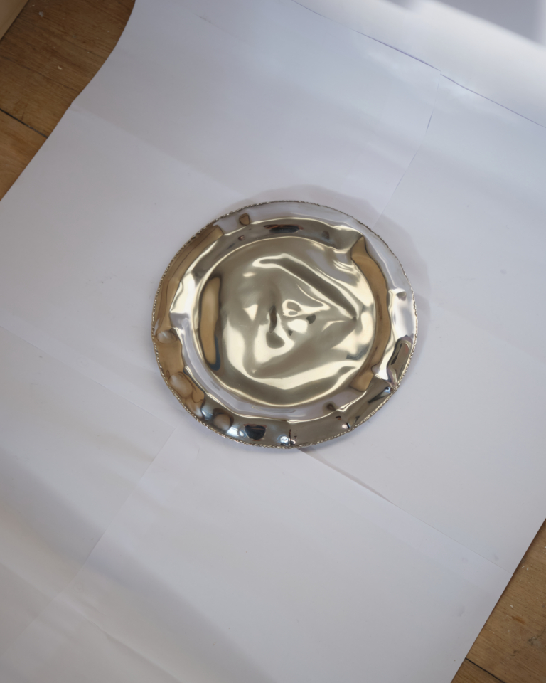 Inflated Metal Plate